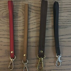 Leather Wristlet Straps 2) Michael Kors, 1)Fossil and 1) Unknown